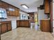 Open kitchen with wood cabinets, and updated appliances at 25 Ridgeview Dr, Jonesboro, GA 30236