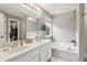 Bathroom boasts a double vanity and a relaxing soaking tub at 3819 Chattahoochee Summit Se Dr, Atlanta, GA 30339