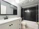 Bathroom with shower and black tile at 3125 Colonial Way # M, Atlanta, GA 30341