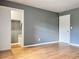 Bedroom with hardwood floors, closet and white door at 3125 Colonial Way # M, Atlanta, GA 30341