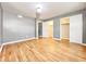 Bright bedroom featuring hardwood floors, neutral walls, and closets at 3125 Colonial Way # M, Atlanta, GA 30341