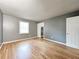 Bedroom with hardwood floors, neutral paint, and closet at 3125 Colonial Way # M, Atlanta, GA 30341