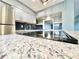 Kitchen featuring white cabinets, granite countertops, and stainless steel appliances at 3125 Colonial Way # M, Atlanta, GA 30341