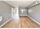 Spacious living room featuring hardwood floors with plenty of natural light at 3125 Colonial Way # M, Atlanta, GA 30341