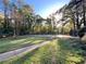 Community tennis court surrounded by lush trees at 3125 Colonial Way # M, Atlanta, GA 30341