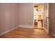 View of a bedroom space with hardwood floors at 250 Big Oak Rd, Whitesburg, GA 30185