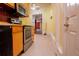 A cozy, yet functional kitchen with retro appliances and yellow walls at 250 Big Oak Rd, Whitesburg, GA 30185