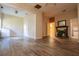 A large living room with wood flooring, white walls and views of other rooms at 250 Big Oak Rd, Whitesburg, GA 30185