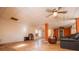 Spacious living room with ceiling fan and vintage ceiling at 250 Big Oak Rd, Whitesburg, GA 30185