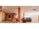 Spacious living room with vintage ceiling, and orange painted walls at 250 Big Oak Rd, Whitesburg, GA 30185