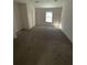 Bright bedroom featuring carpet and a window at 6745 Trafalger Sq, Norcross, GA 30093