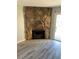 Stone fireplace in living room at 6745 Trafalger Sq, Norcross, GA 30093