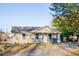 Charming single-story home featuring a covered front porch and a well-maintained lawn at 2502 Park Dr, Lithonia, GA 30058