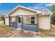 Attractive single-story home boasting a covered front porch and neatly maintained front yard at 2502 Park Dr, Lithonia, GA 30058