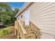 Home exterior with stairs and a white door at 2502 Park Dr, Lithonia, GA 30058
