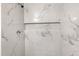 Bright shower with a chrome shower head and built-in shelving at 2502 Park Dr, Lithonia, GA 30058