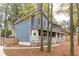 Two-story house with wrap around porch, shutters and landscaping at 101 Emily Ln, Carrollton, GA 30116