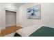 Simple bedroom offers closet space, natural light, and a calm atmosphere for rest and relaxation at 242 12Th Ne St # 14, Atlanta, GA 30309
