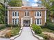 Charming brick apartment building with classic architectural details and well-maintained landscaping at 242 12Th Ne St # 14, Atlanta, GA 30309