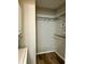 Convenient laundry closet with washer, dryer, and shelving at 4090 Chastain Park Ne Ct, Atlanta, GA 30342