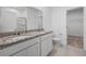 Bathroom featuring a double sink vanity with granite counters and a tile floor at 3087 Birdsong Ave, Covington, GA 30016
