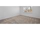 Bright bedroom with neutral carpet and large windows offering plenty of natural light at 3087 Birdsong Ave, Covington, GA 30016