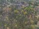 Great aerial view of treed lot surrounded by lush trees, perfect for building a home at 5655 Campbellton Sw Rd, Atlanta, GA 30331