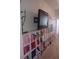 Room with large shelving unit, TV, and decor at 102 Ozark Trl, Canton, GA 30114