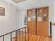 Hallway with wood floors and built-in shelving at 276 Lakemoore Ne Dr # E, Atlanta, GA 30342