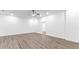 Spacious bedroom features a ceiling fan, recessed lighting, and hardwood floors at 3785 Lower Roswell Rd, Marietta, GA 30068