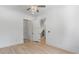 Bright bedroom features hardwood floors, neutral walls, and an elegant ceiling fan at 3785 Lower Roswell Rd, Marietta, GA 30068