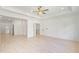 Bright, spacious bedroom with hardwood floors, a ceiling fan, and ample natural light at 3785 Lower Roswell Rd, Marietta, GA 30068