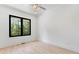 Light-filled bedroom features a large window overlooking a green treeline at 3785 Lower Roswell Rd, Marietta, GA 30068