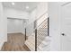 Modern staircase design with horizontal railings and hardwood treads at 3785 Lower Roswell Rd, Marietta, GA 30068