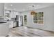 Modern kitchen with white cabinets and stainless steel appliances at 2954 Lighthouse Ct, Acworth, GA 30101