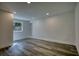 Finished basement with neutral walls and wood-look flooring at 773 Harwell Nw Rd, Atlanta, GA 30318
