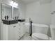 Modern bathroom with double vanity, soaking tub, and marble flooring at 773 Harwell Nw Rd, Atlanta, GA 30318