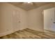 Bright bedroom with wood-look floors and an adjacent closet at 773 Harwell Nw Rd, Atlanta, GA 30318