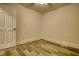 Spacious bedroom with light walls and wood-look floors at 773 Harwell Nw Rd, Atlanta, GA 30318