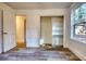 Bedroom with large closet, window, and wood-look floors at 773 Harwell Nw Rd, Atlanta, GA 30318