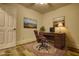 Home office features wood desk, leather chair, and hardwood floors at 773 Harwell Nw Rd, Atlanta, GA 30318