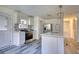 Renovated kitchen featuring stainless steel appliances and white cabinetry at 773 Harwell Nw Rd, Atlanta, GA 30318