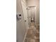 A half bathroom visible through a door with a modern sink and toilet at 1267 Lucan Nw Ln # Wc217, Lawrenceville, GA 30043