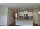 Bright kitchen featuring stainless steel appliances, granite countertops, and a breakfast bar at 1267 Lucan Nw Ln # Wc217, Lawrenceville, GA 30043