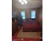 Bedroom features natural light, two windows and ample closet space for storage at 745 Shiloh Nw Rd, Kennesaw, GA 30144