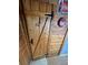 Charming wooden door with decorative hinges and Coca-Cola memorabilia at 745 Shiloh Nw Rd, Kennesaw, GA 30144