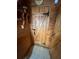 Charming wooden door with decorative hinges and Coca-Cola memorabilia at 745 Shiloh Nw Rd, Kennesaw, GA 30144