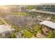 Aerial view of a community with green spaces, surrounding buildings and outdoor event at 318 Sandy Springs Cir # 150, Atlanta, GA 30308