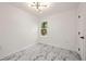 Bright bedroom featuring marble-look flooring and a window at 641 Hamilton E Holmes Nw Dr, Atlanta, GA 30318