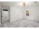 Bright bedroom with marble-look floors and modern doors at 641 Hamilton E Holmes Nw Dr, Atlanta, GA 30318